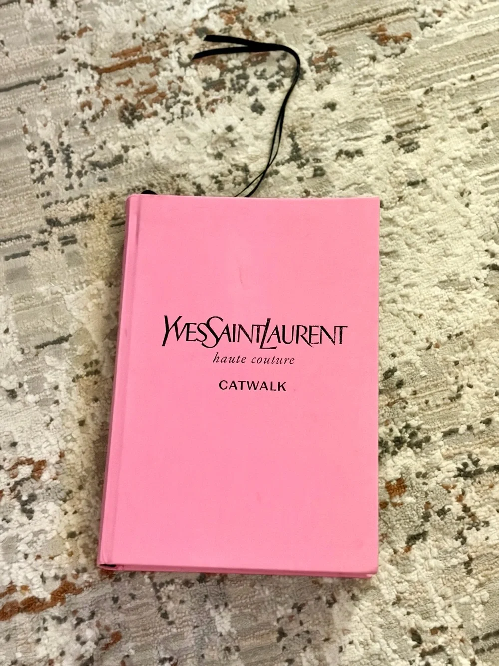 Yves Saint Laurent Pink Hardcover Haute Couture Book.